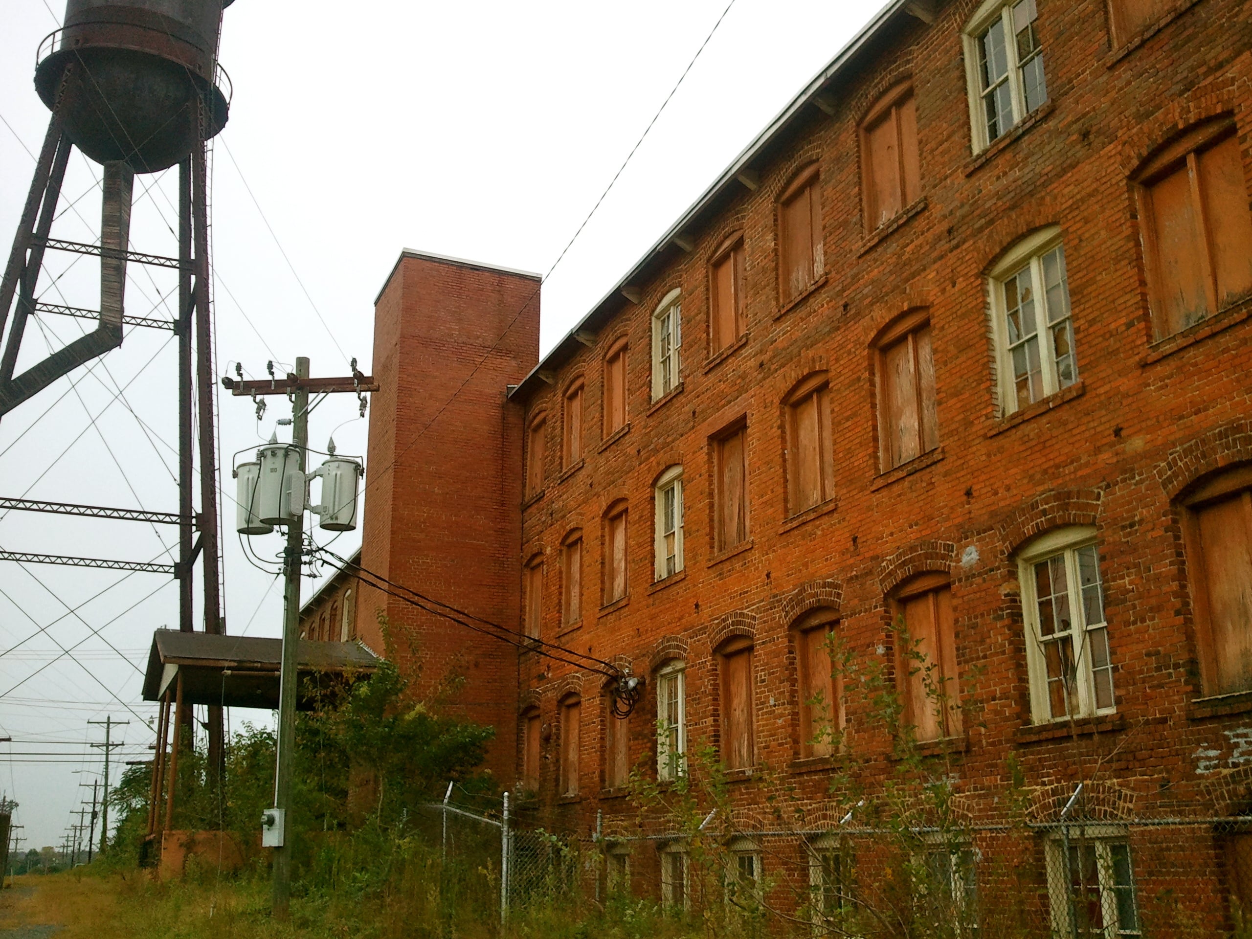 Historic Piedmont Buggy Factory building in downtown Monroe, NC